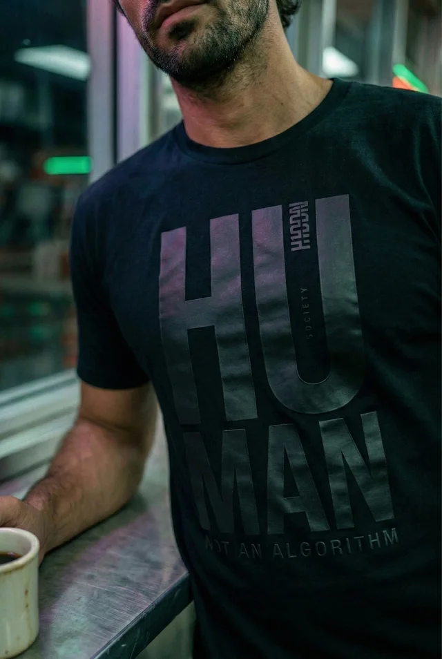 Close-up of Human lettering catching the coloured light of a diner